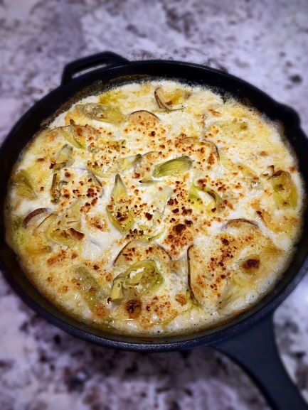 Potatoes Au Gratin with Artichokes and Goat Cheese