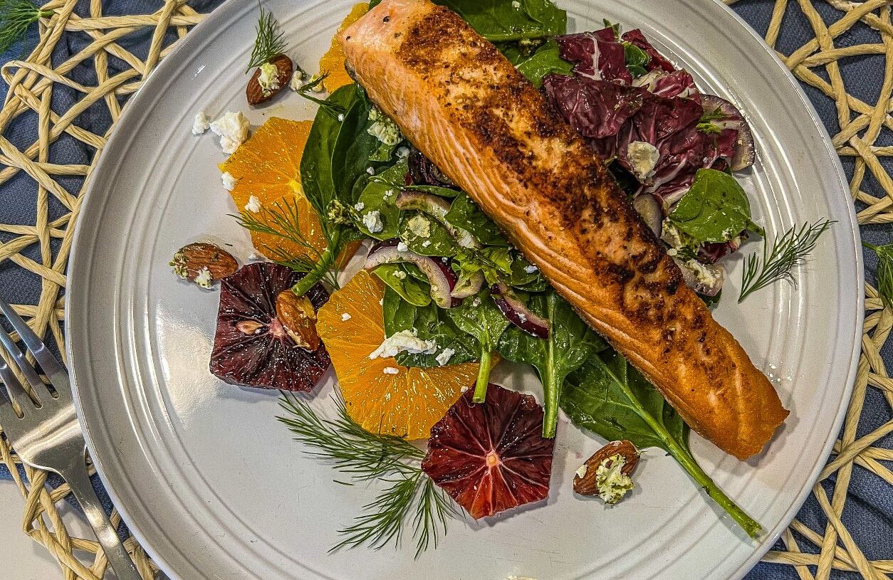 Seared Salmon Salad with Blood Oranges, Roasted Almonds, Goat Cheese and Homemade Citrus Herb Vinaigrette